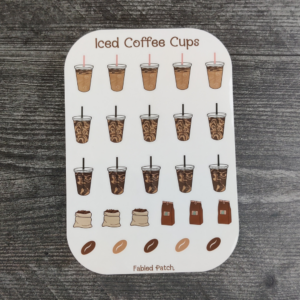 A sticker sheet featuring 15 iced coffee cups with straws, three coffee bean sacks, three bags of coffee, and five individual coffee beans.